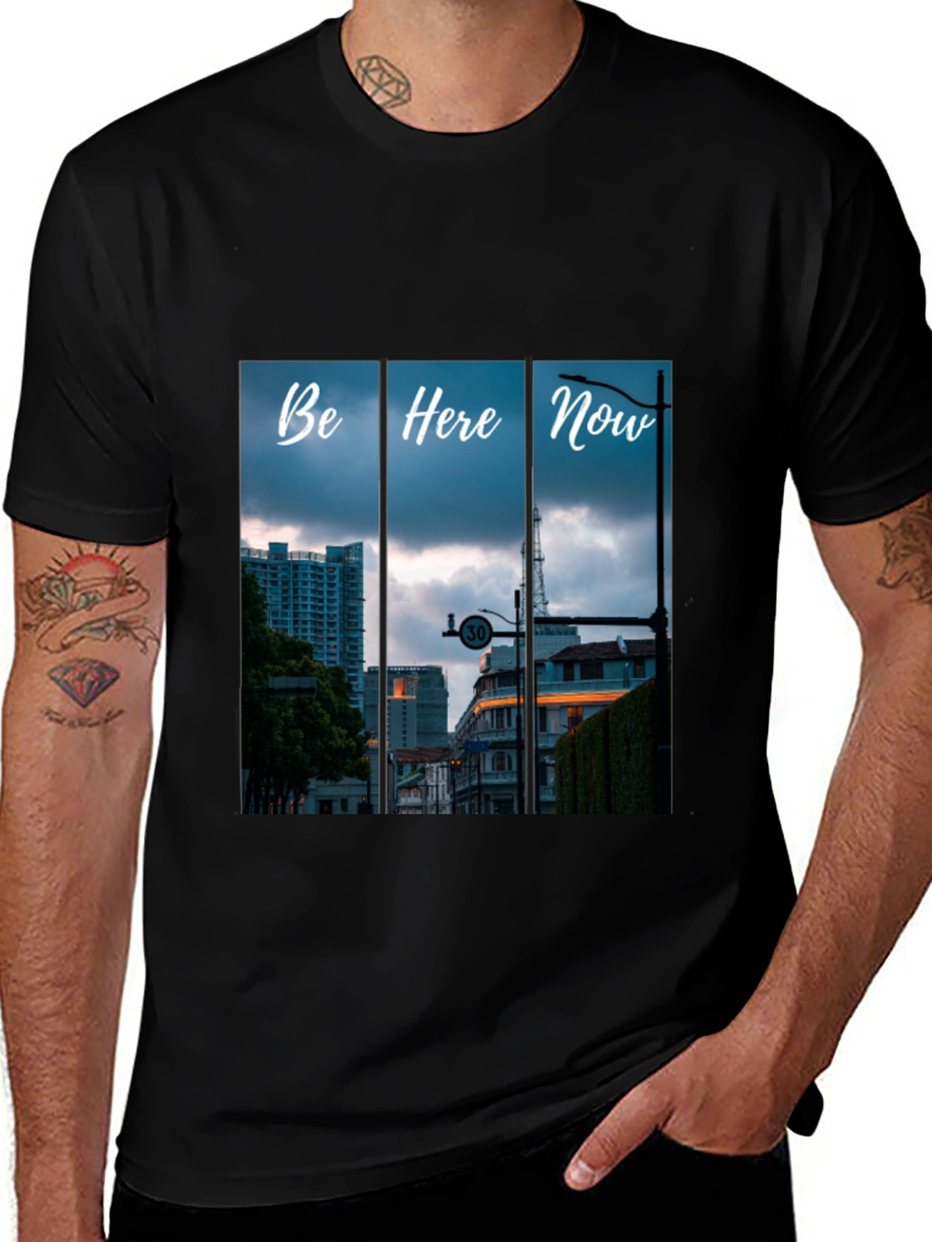 Be Here Now Black T-Shirt with Cityscape Design